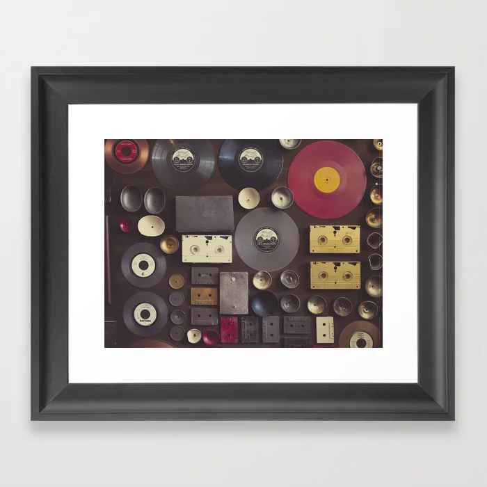 Music. Vintage wall with vinyl records and audio cassettes hung. Framed Art Print